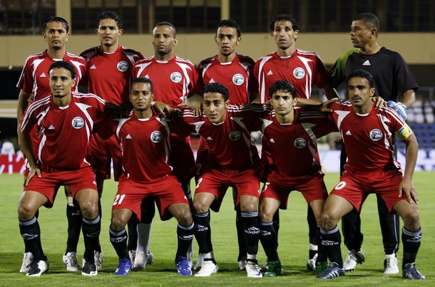 Yemen national team players pose for a group photo before the match against UAE during their Gulf Cup soccer match in Muscat